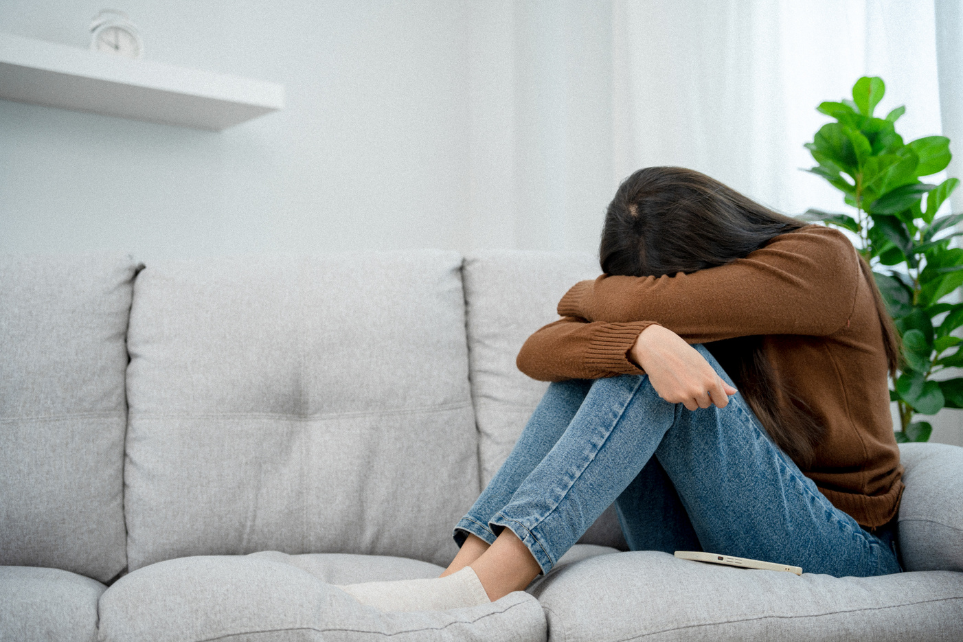 Depression and mental illness. Beautiful Asian woman disappo